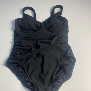 One piece Trim shaper bathing suit. Black sz 12 . Vacation cruise beach wear.